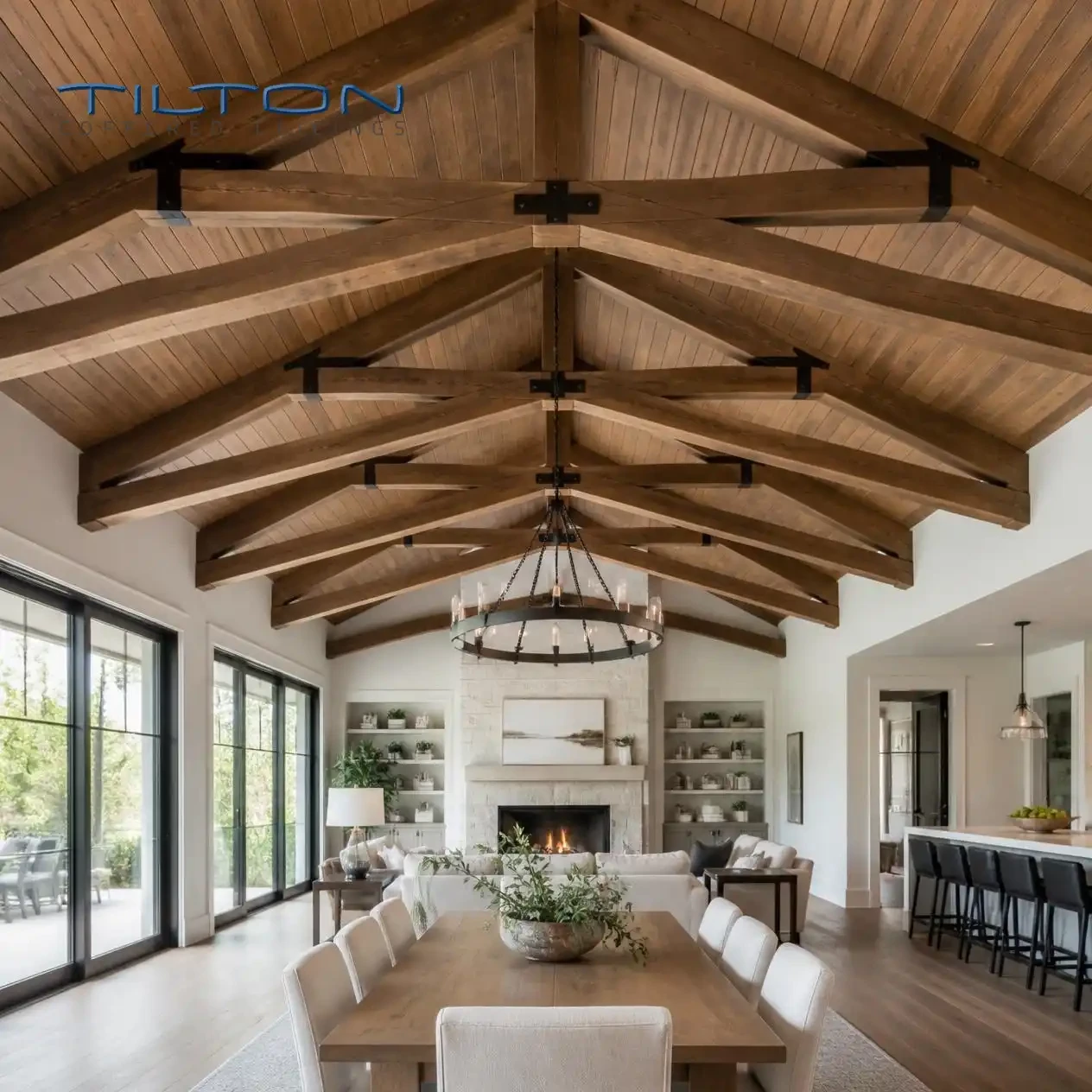 Scissor-style faux wood truss following the slope of a vaulted living room ceiling